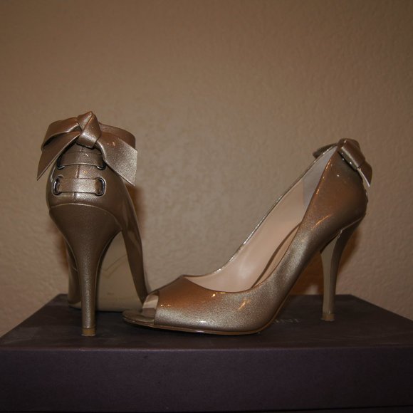Enzo Angiolini Shoes - Enzo Angiolini Gold Patent Heels with Bow Accent